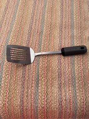 Vintage EKCO slotted spatula stainless steel blade and black rubber grip handle
